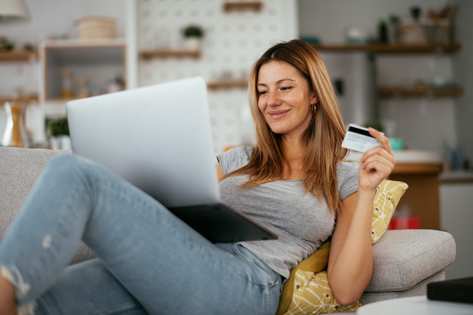 A clean eCommerce checkout on a laptop or phone with a secure pay button; modern and trustworthy