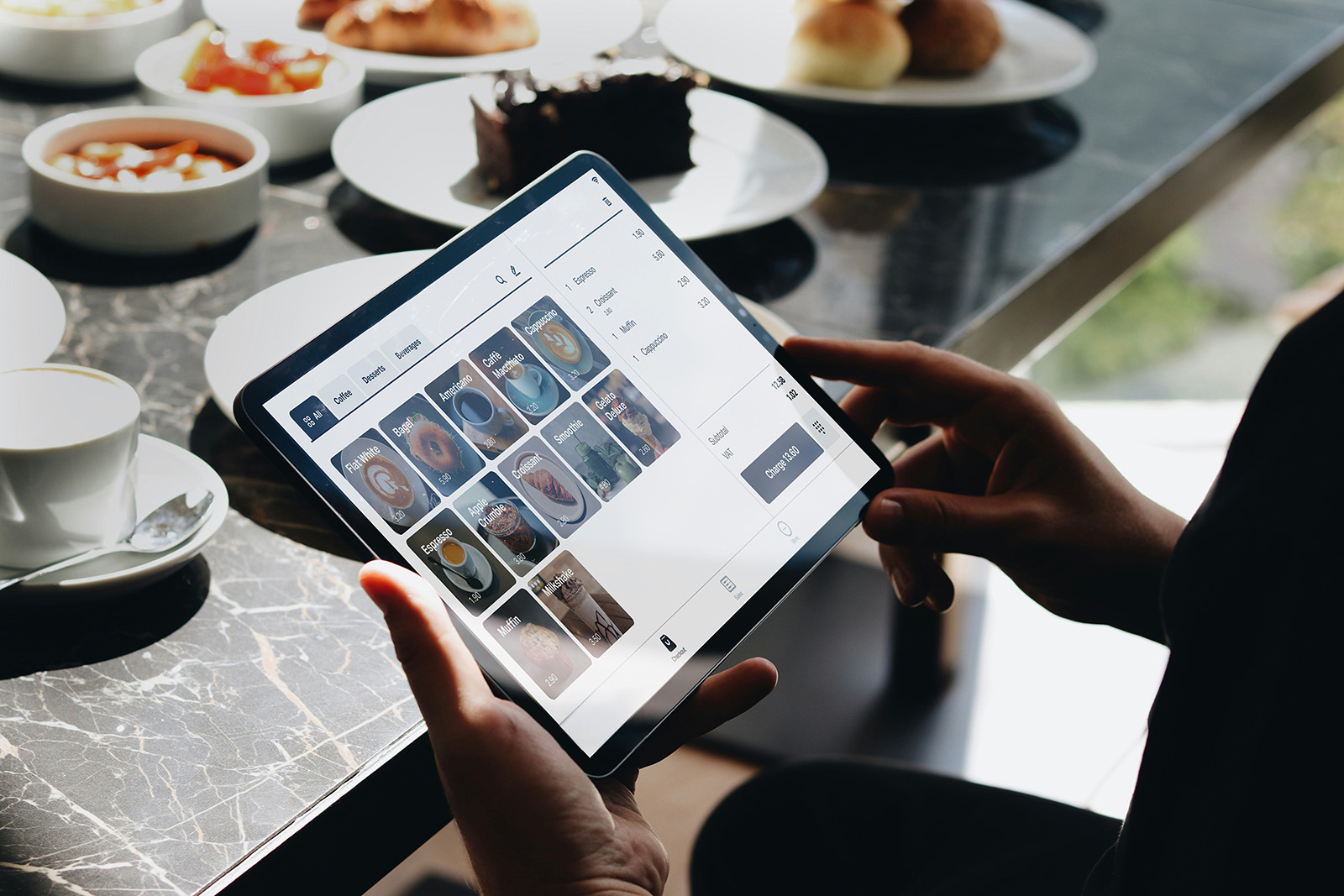 A sleek cloud POS on a tablet or terminal with a clean dashboard; modern and capable
