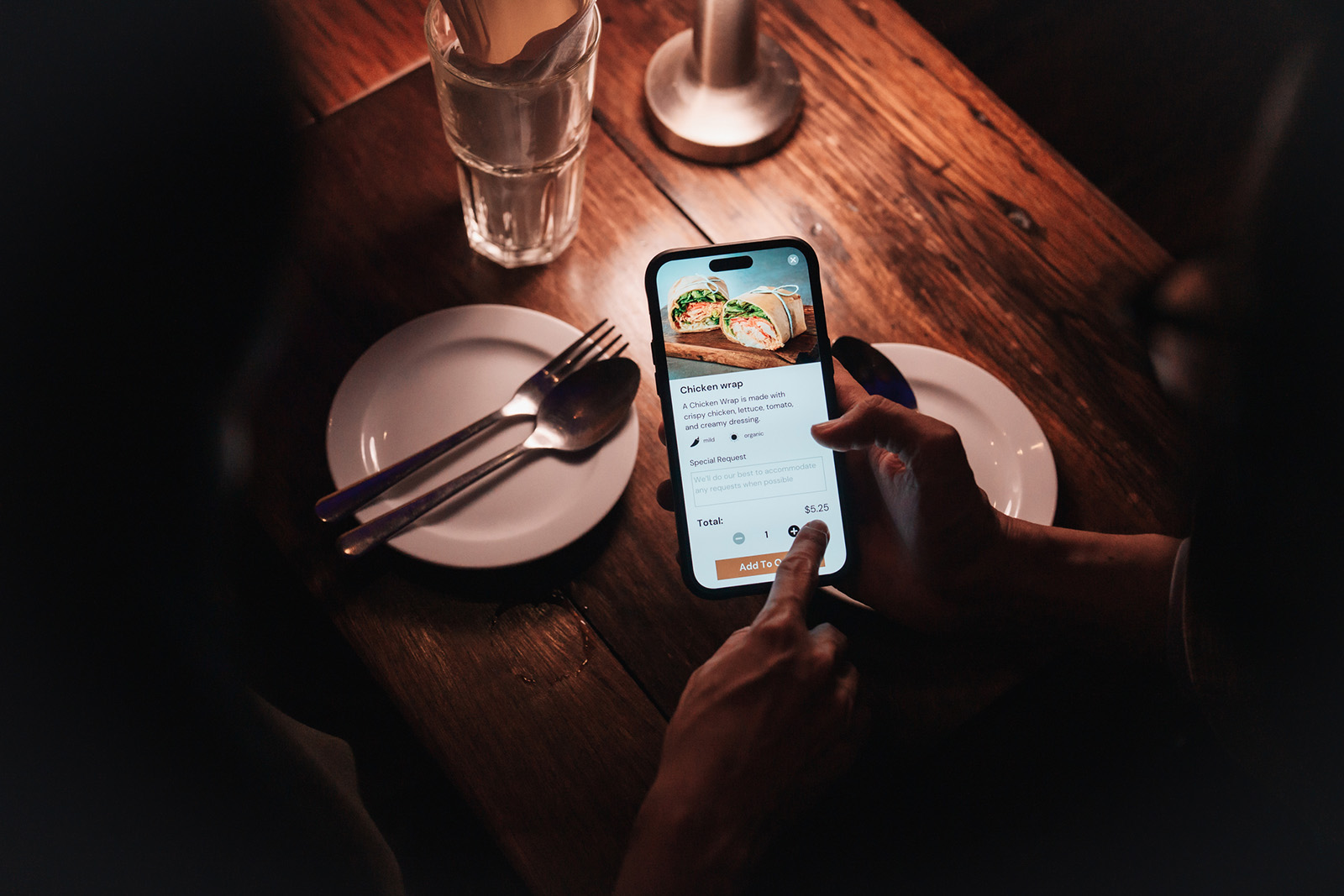 A phone screen showing an itemized restaurant check with a tip prompt; clean, friendly UI feel
