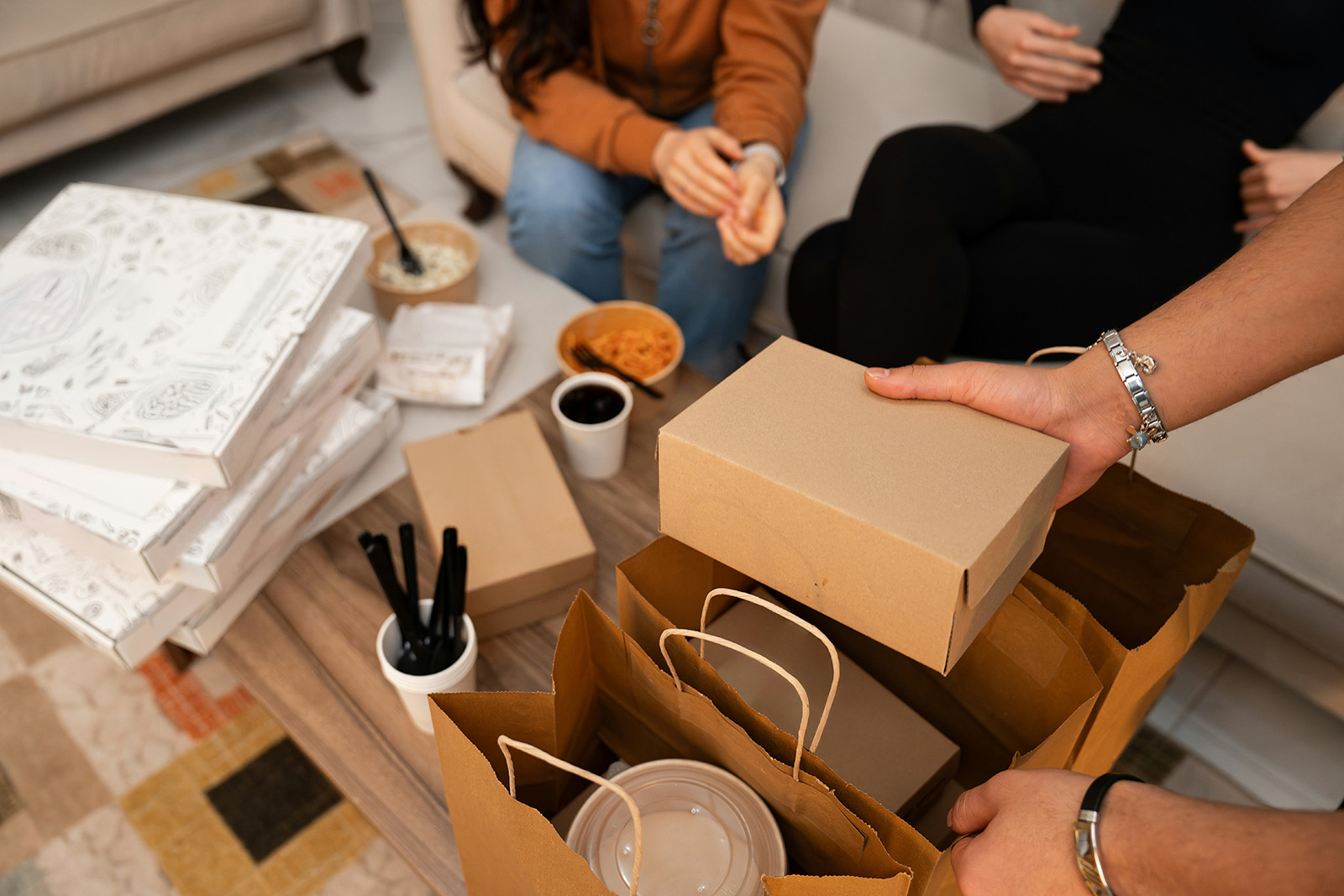 Branded delivery packaging for a ghost-kitchen concept, or a kitchen running multiple tickets